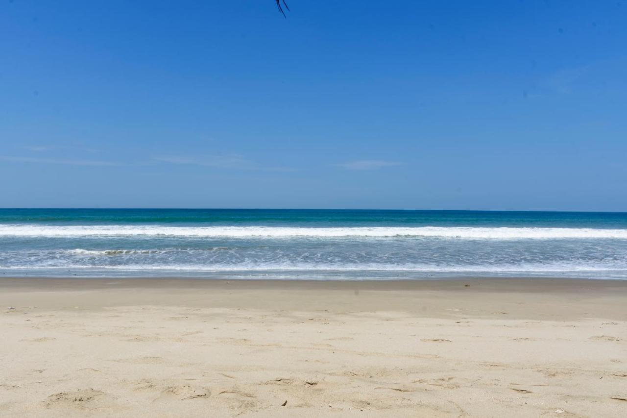 Wallac Bungalows Canoas De Punta Sal Bagian luar foto