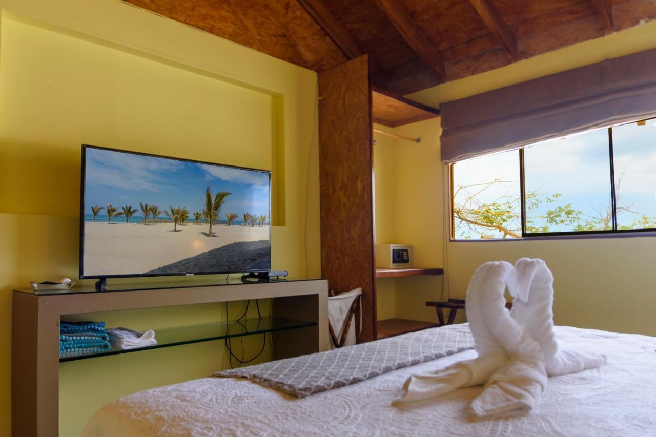 Wallac Bungalows Canoas De Punta Sal Bagian luar foto